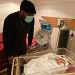 E Money pays visit to Kcee's wife and new born baby